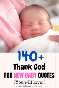 Newborn baby laying down smiling.