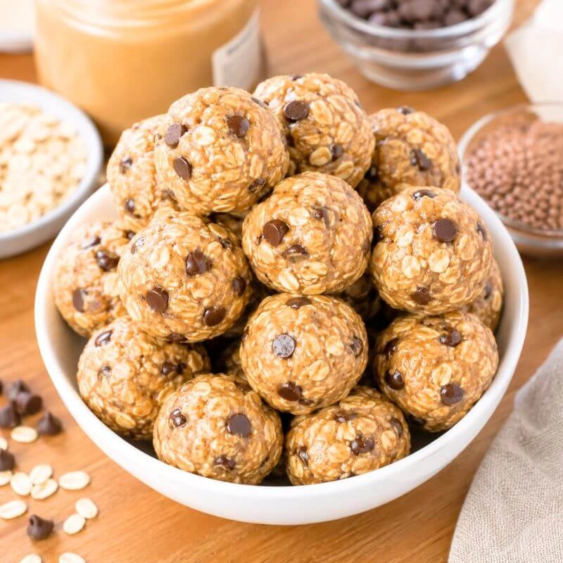 Homemade peanut butter energy balls with rolled oats, flaxseed, honey, and mini chocolate chips.