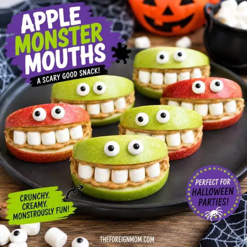 Apple monster mouths made with red and green apple slices, peanut butter, mini marshmallow teeth, and edible candy eyes for a fun Halloween snack for kids.